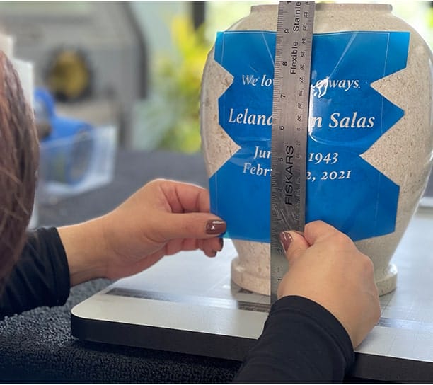 measuring the urn with a ruler