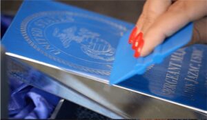 applying a squeegee on a mask